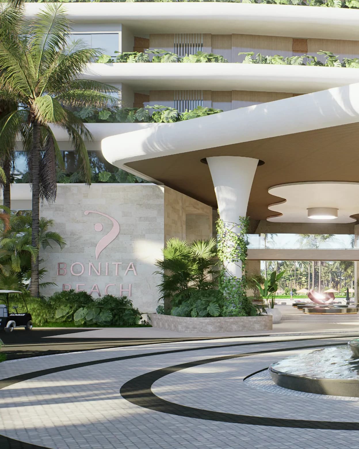 L’entrée de Bonita Beach : une sculpture de pierre et une fontaine sous un plafond de bois, avec le hall et la lagune au fond.